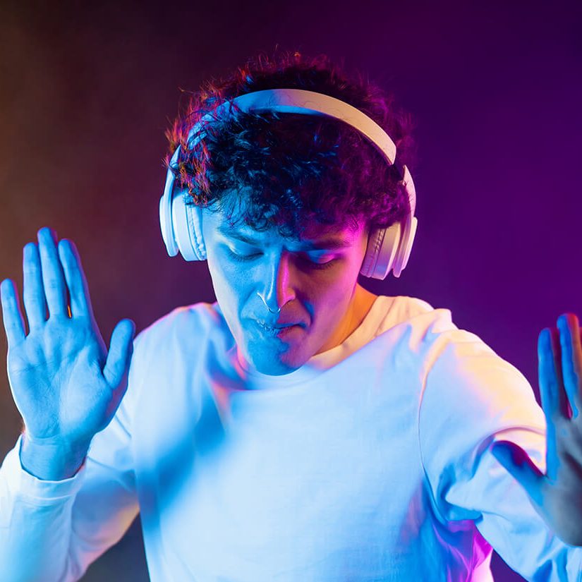 positive-man-listening-music-with-headphones.jpg positive-man-listening-music-with-headphones.jpg